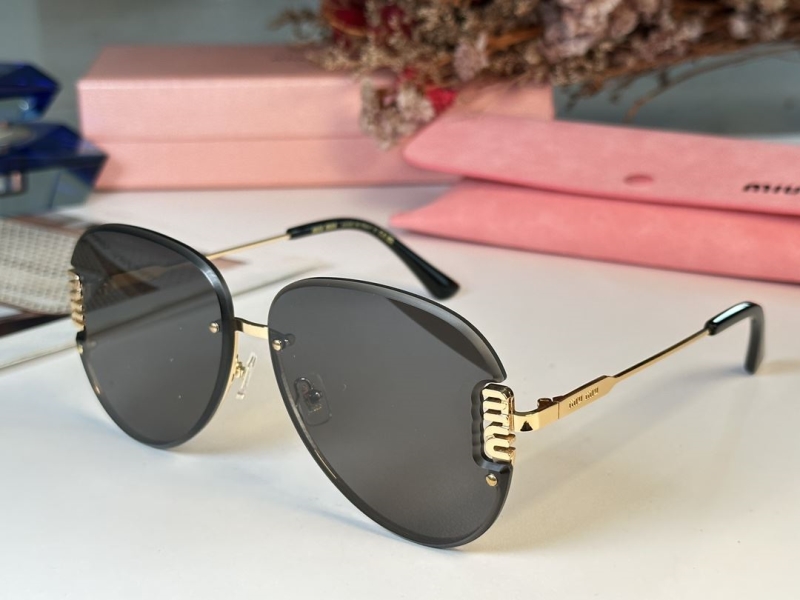 Miu miu Sunglasses